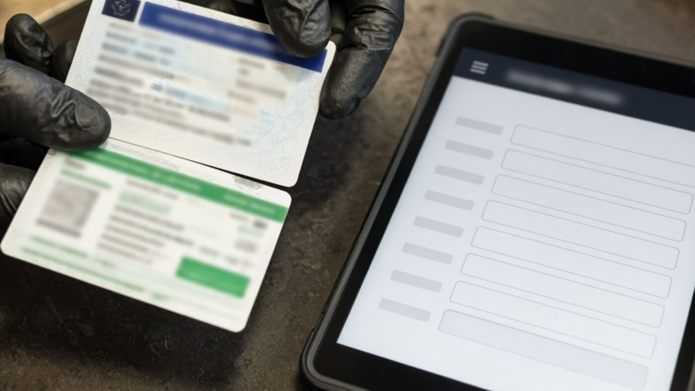 Cards next to a tablet form